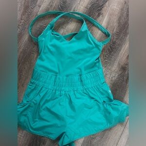 FP Movement Get Your Flirt On Shortsie in Sport Green. Size L